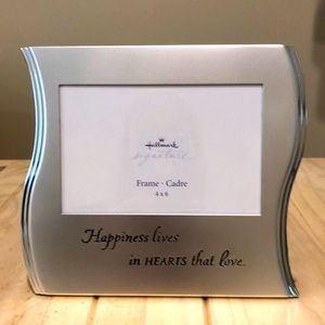 Brushed metal 4x6 frame.”Happiness lives in hearts